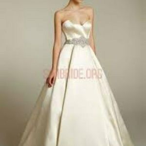 Lazaro cream silk and satin wedding dress